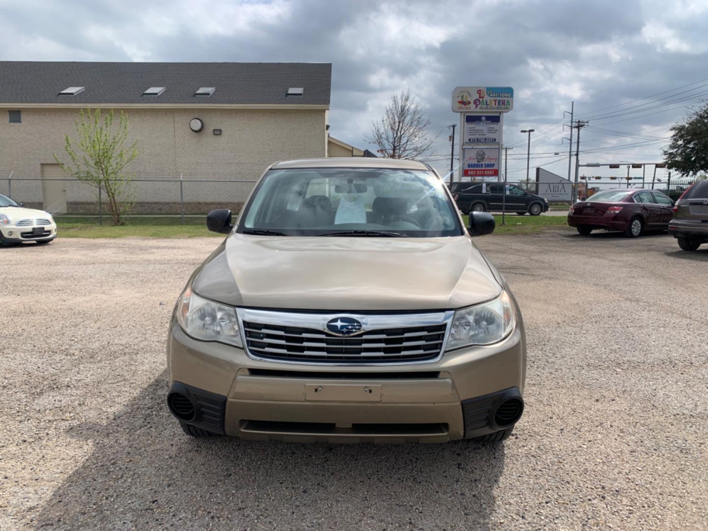 2009 Gold /Black Subaru Forester (JF2SH61649H) with an 2.5L FI SOHC 150 CID engine, AUTOMATIC transmission, located at 1830 North Belt Line Road, Irving, TX, 75061, (469) 524-0199, 32.834373, -96.993584 - Photo#3